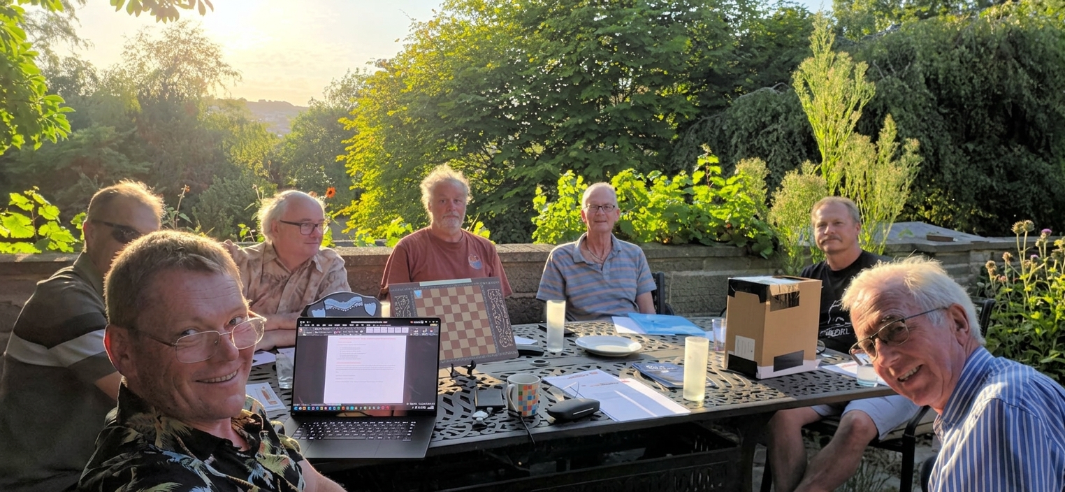 People sitting around a table outside